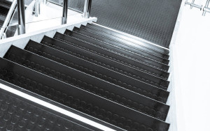 Studded rubber is popular on commercial stairways for its slip resistance